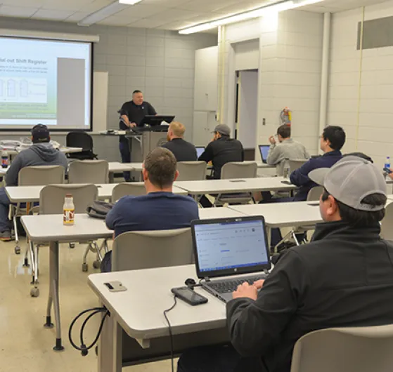 Brent Phillips addresses his electrical circuits class. 